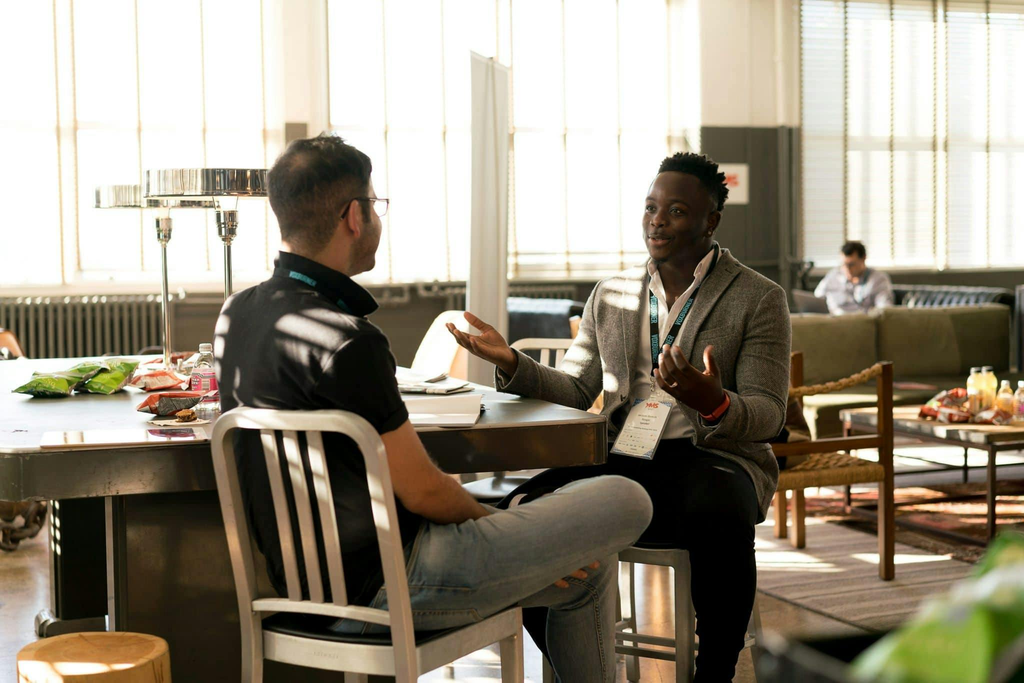 Two salesmen having a conversation.